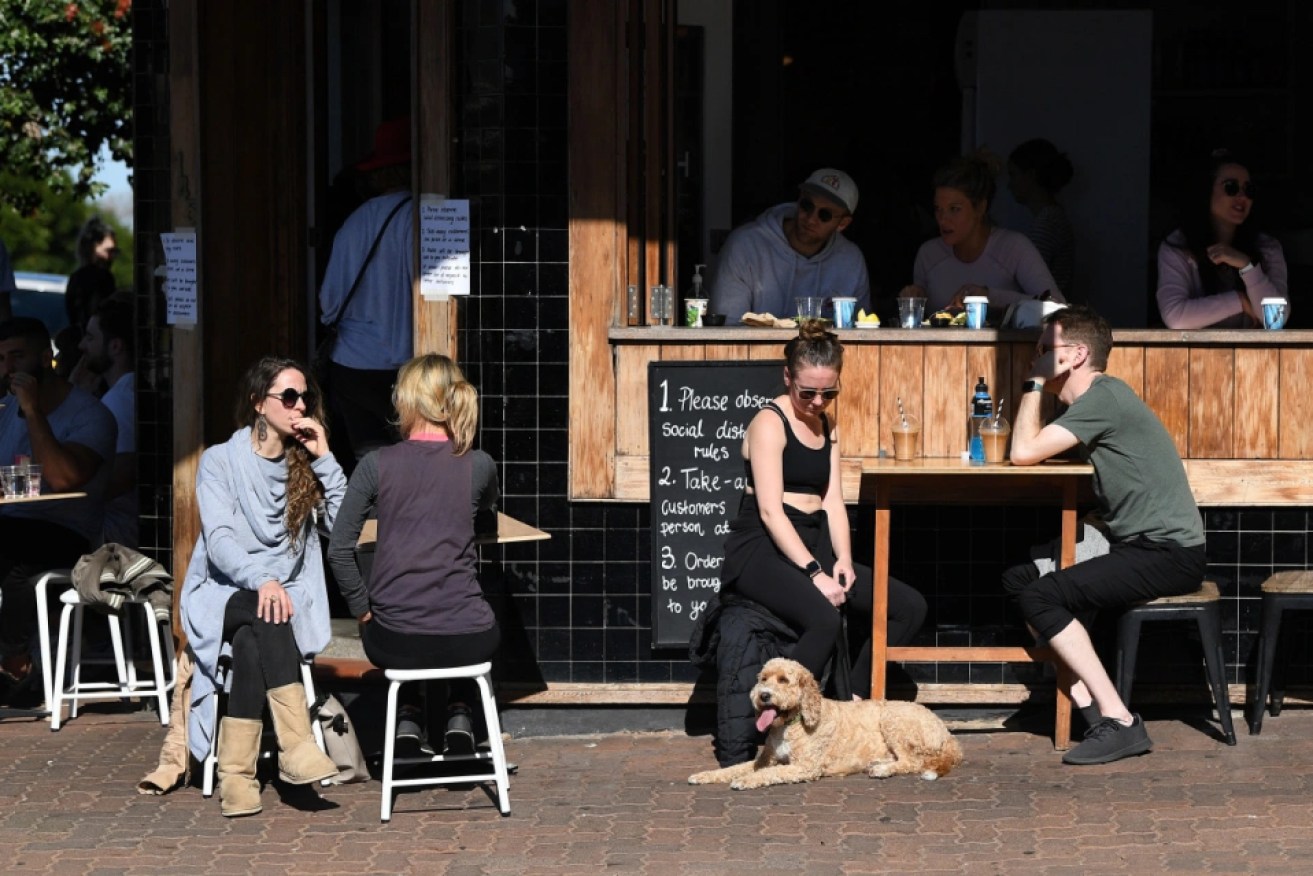 A return to restaurants and tourism has driven a "strong" first quarter for Australia's economy. 