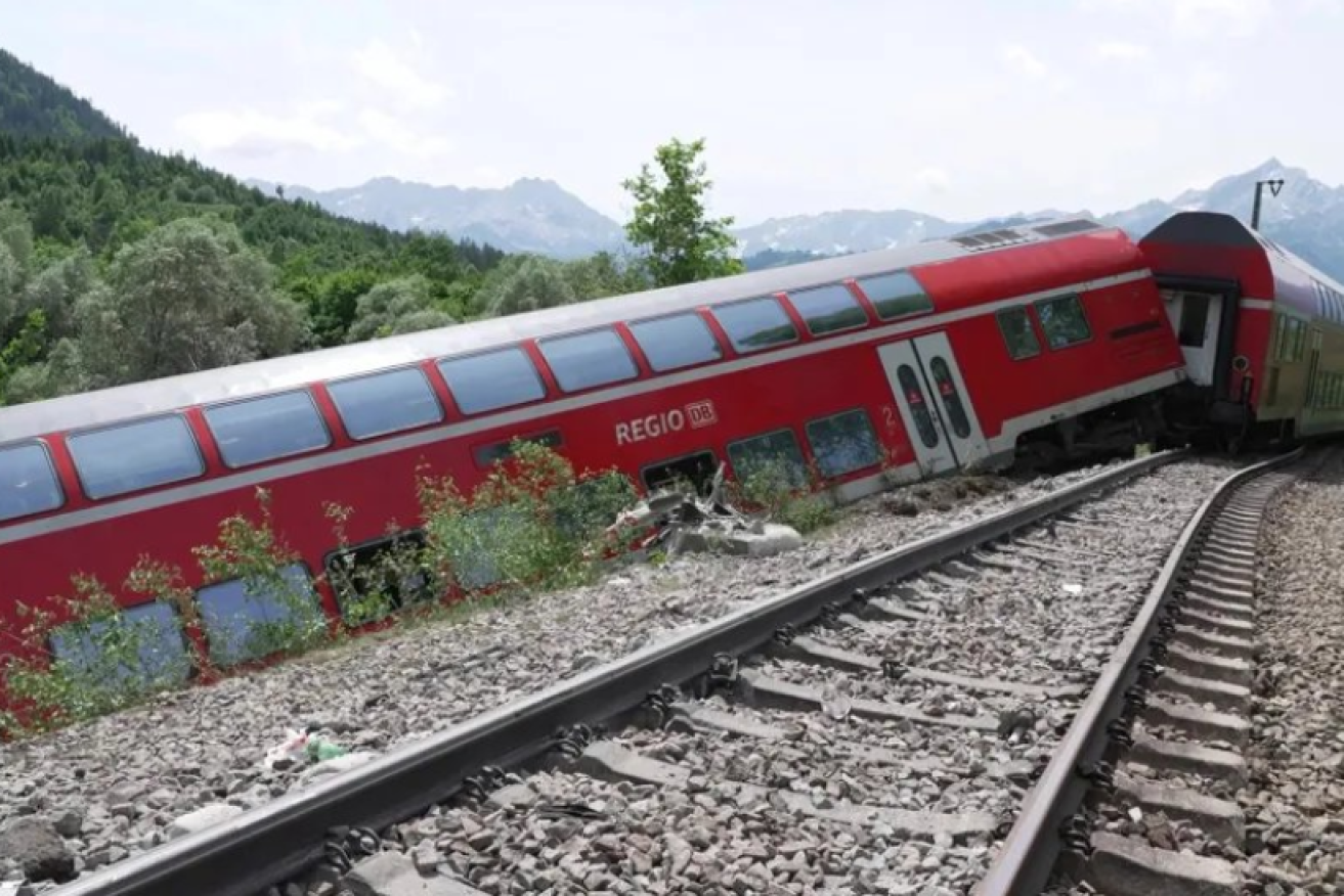 One of the packed train's carriages where it came to rest after the high speed spill. <i>Photo: Salvi/Twitter</i>