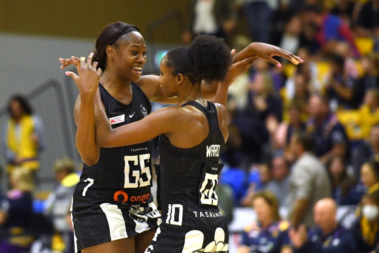 Shimona Nelson and Jodi-Ann Ward celebrate Collingwood's win over Sunshine Coast.