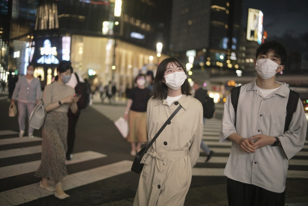 Japan is set to allow in foreign tourists, as long as they are on organised tours, and wear masks.
