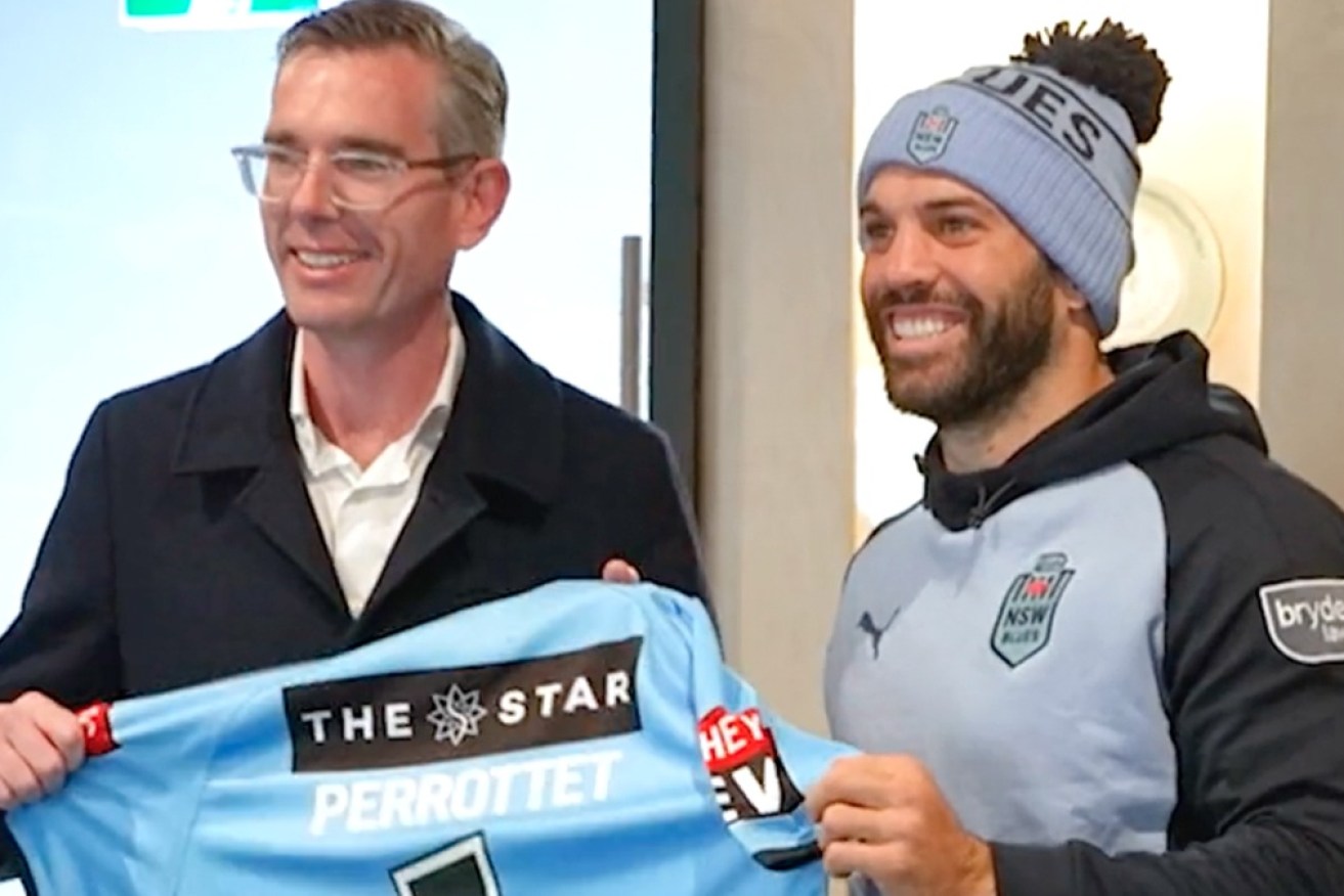 Dominic Perrottet was presented with his own Blues jumper at a training camp last week.