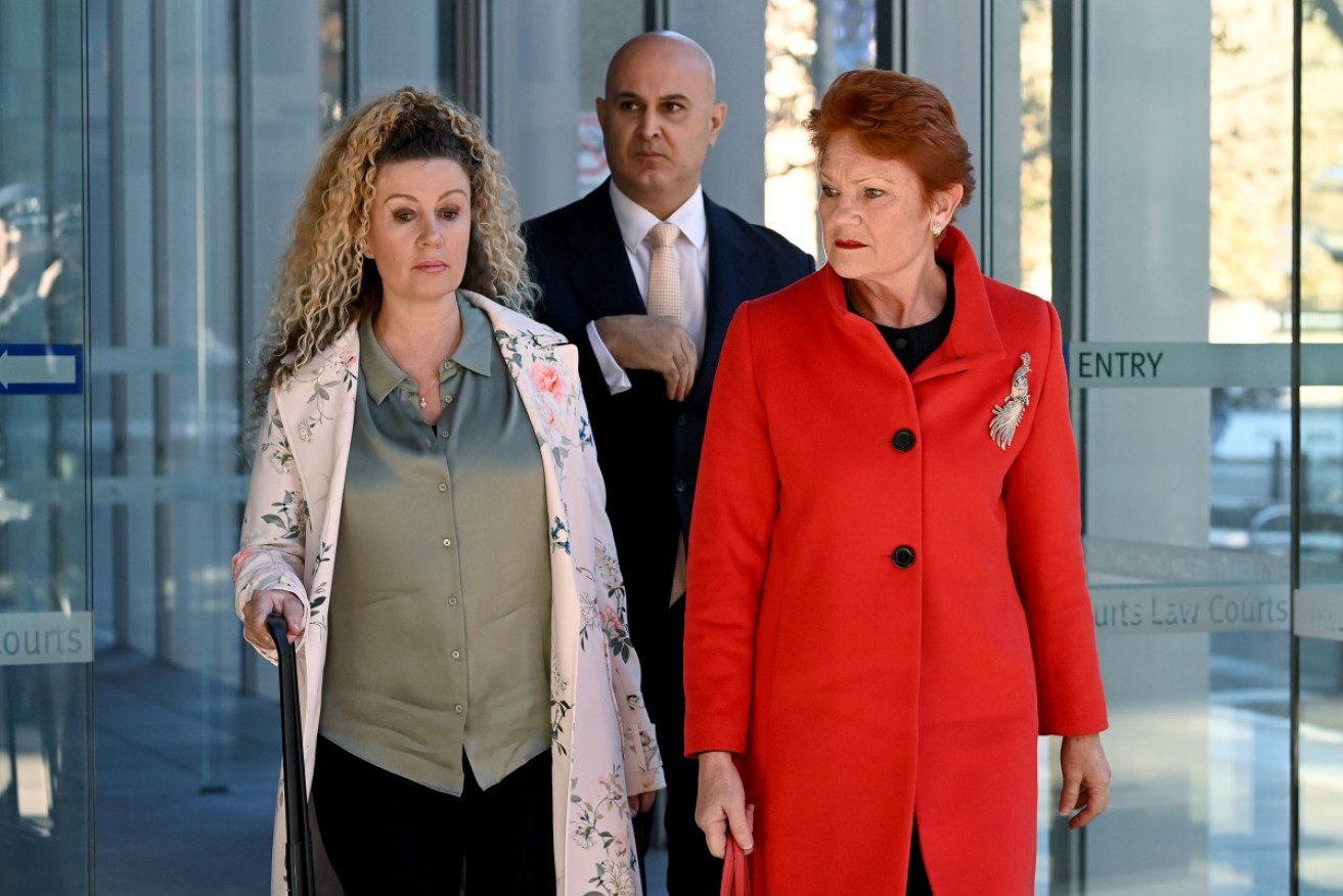 Terri-lea Vairy (left), with One Nation leader Pauline Hanson, says Brian Burston harassed her.