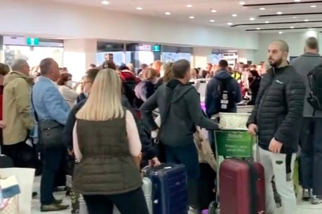 Long queues greet holidaymakers at airports