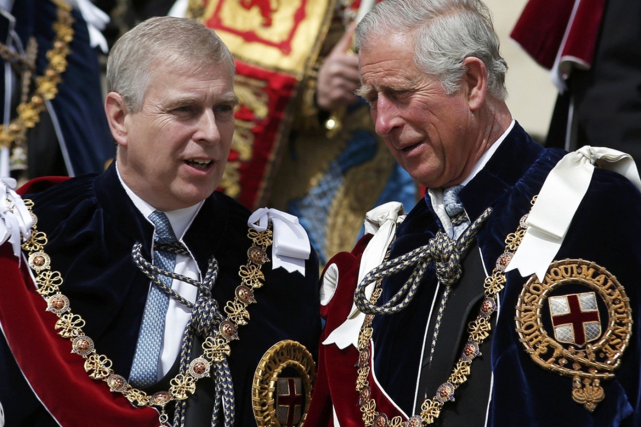 Prince Andrew and older brother Charles at the 2015 Garter parade.