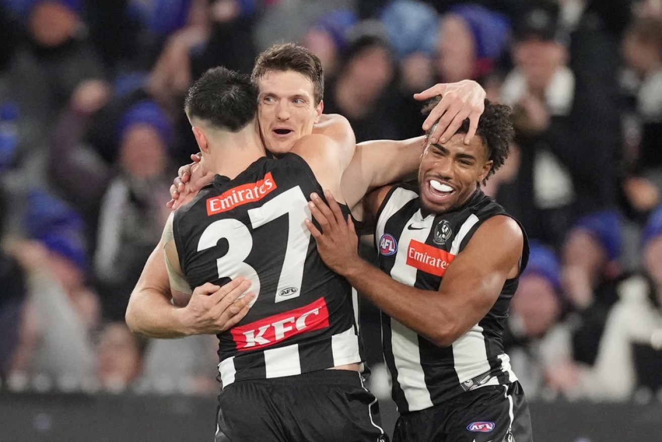 Fast-fnishing Magpies run down Demons in MCG thriller