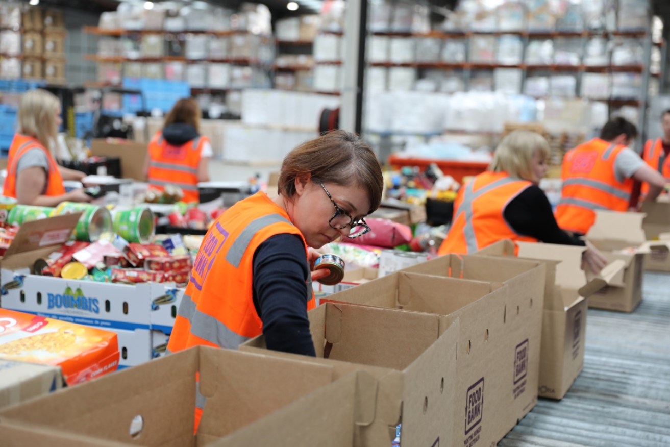 The rising cost of living is driving more Australians to hunger relief charities like Foodbank. 