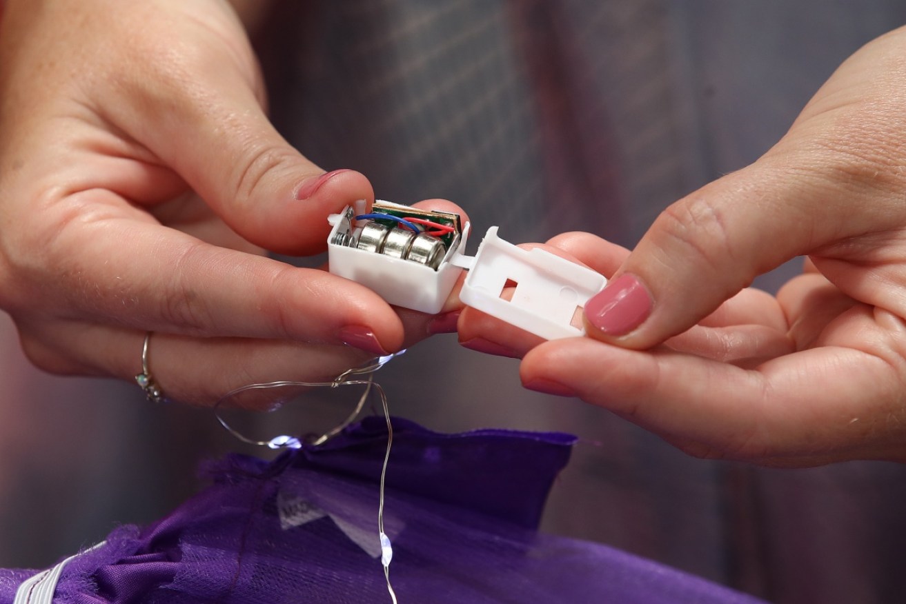 People are being encouraged to check for unsafe button batteries in their homes. 