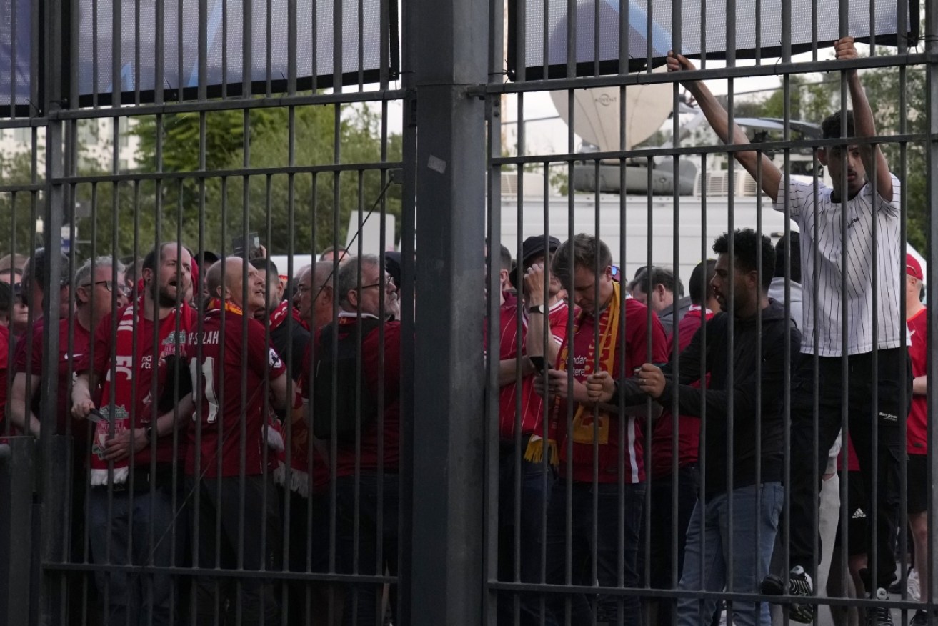 A French minister has apologised to those fans "who suffered from bad management" at the Champions League final.