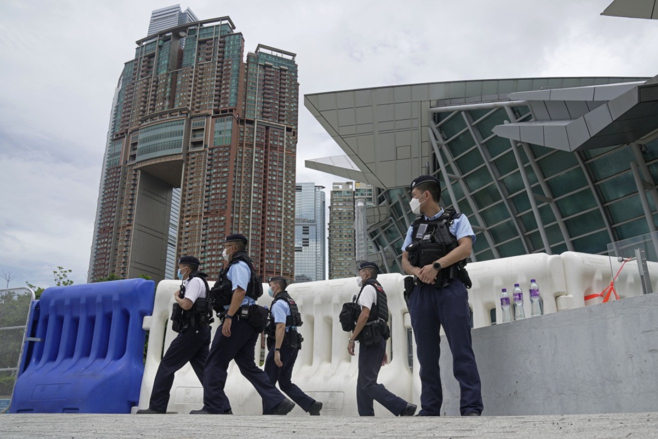 Security is tight in Hong Kong for the arrival of Chinese President Xi Jinping