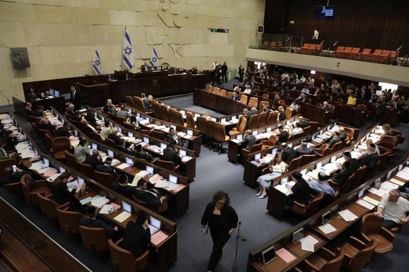 Knesset members participate in the voting session to dissolve the parliament.