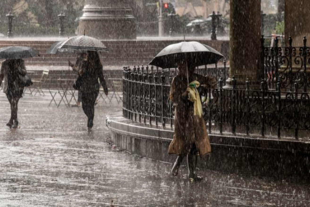 A driving rain pelts down in the centre of Sydney. <i>Photo: Nine News</i>