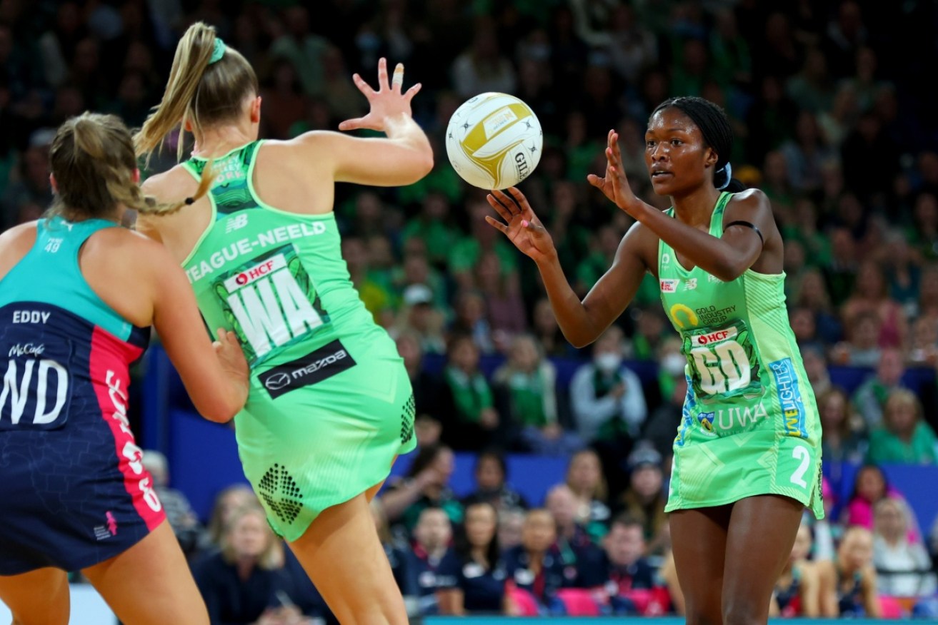 West Coast Fever’s Sunday Aryang passes to Alice Teague-Neeld in Sunday night's final in Perth. 