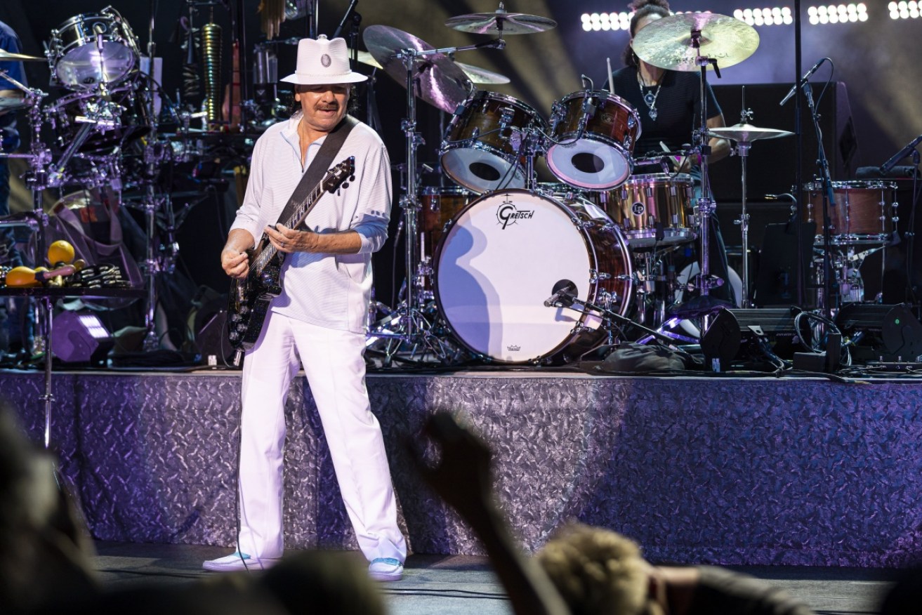 Guitarist Carlos Santana collapsed onstage during a show in Michigan.