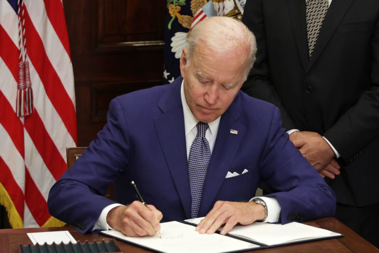 US President Joe Biden signs an executive order on abortion access.
