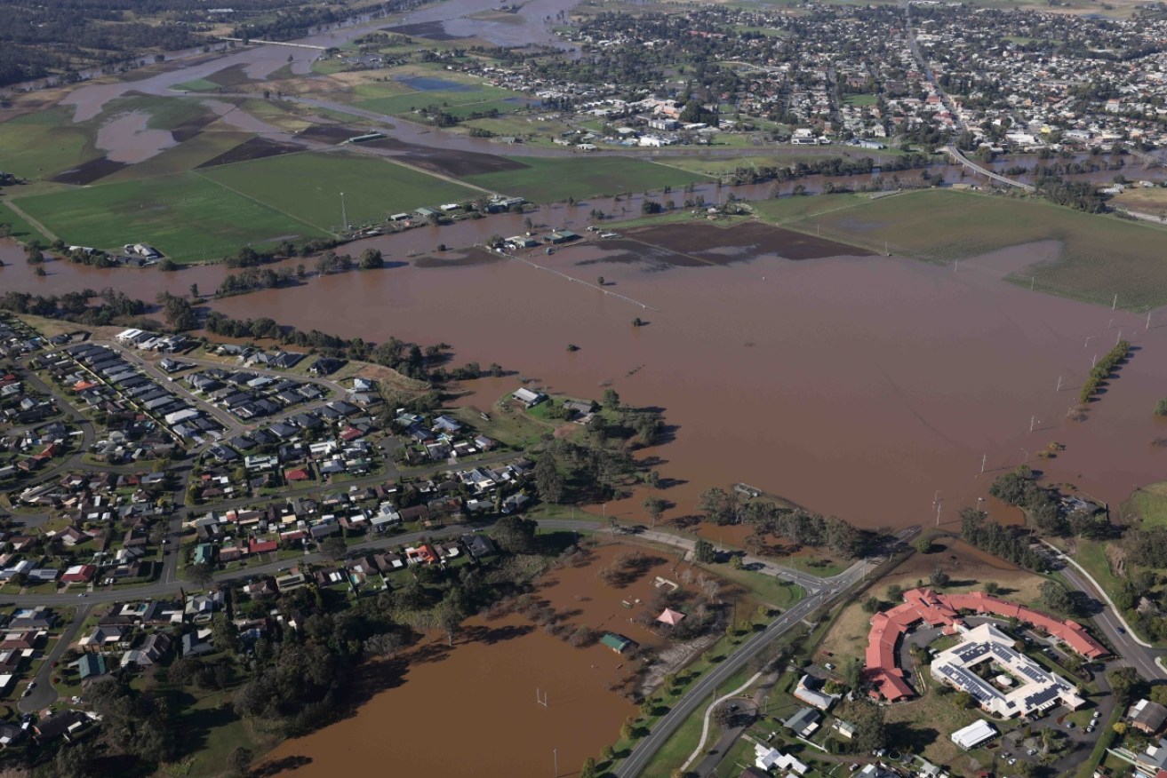 Some flood-hit regions along Australia's east coast are still cleaning up from previous disasters.
