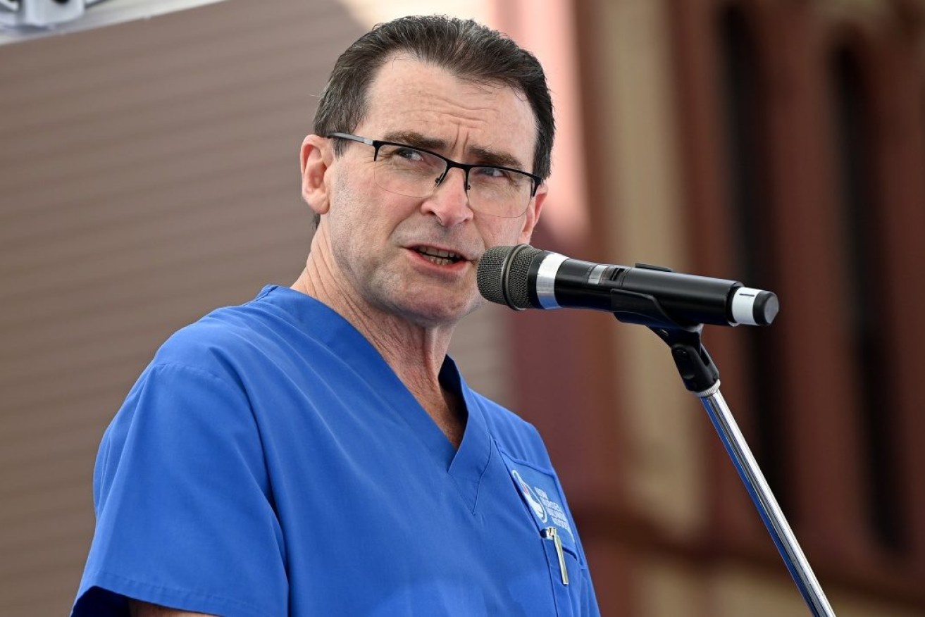 The nurses union's Brett Holmes says COVID-19 and the flu have put immense strain on NSW hospitals.