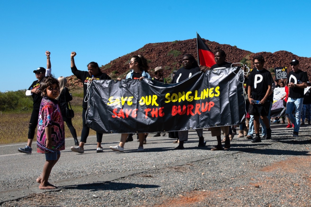 Traditional custodians from the Burrup in WA have brought their fight to protect rock art to Sydney, protesting outside the environment minister's office.