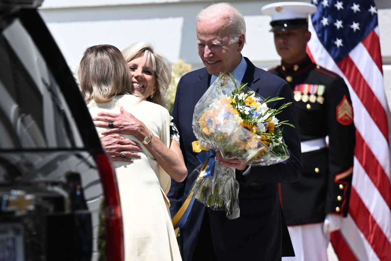 The Bidens greet Olena Zelenska on her arrival at the White House.