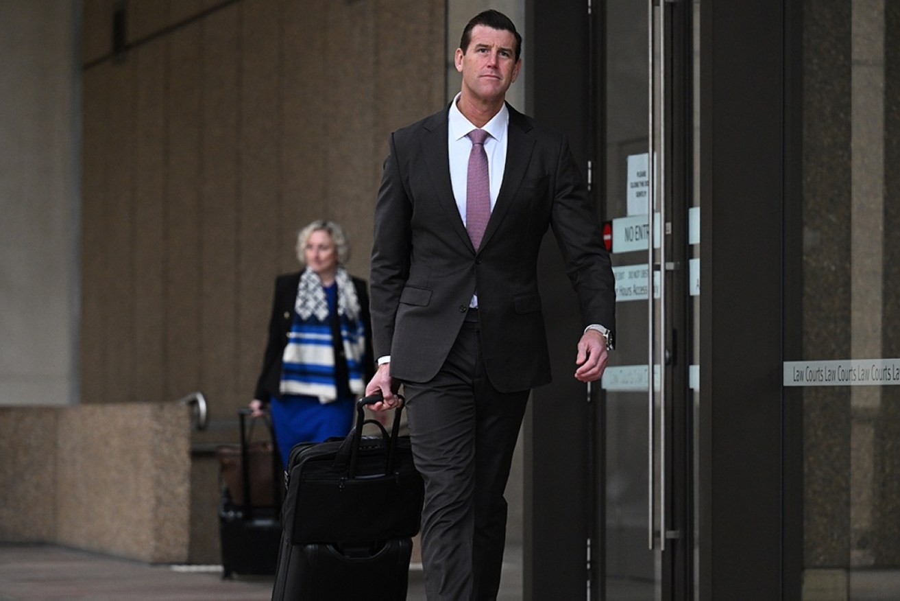 Ben Roberts-Smith, pictured on Tuesday, has been accused of colluding in a lie to cover up an alleged war crime. 