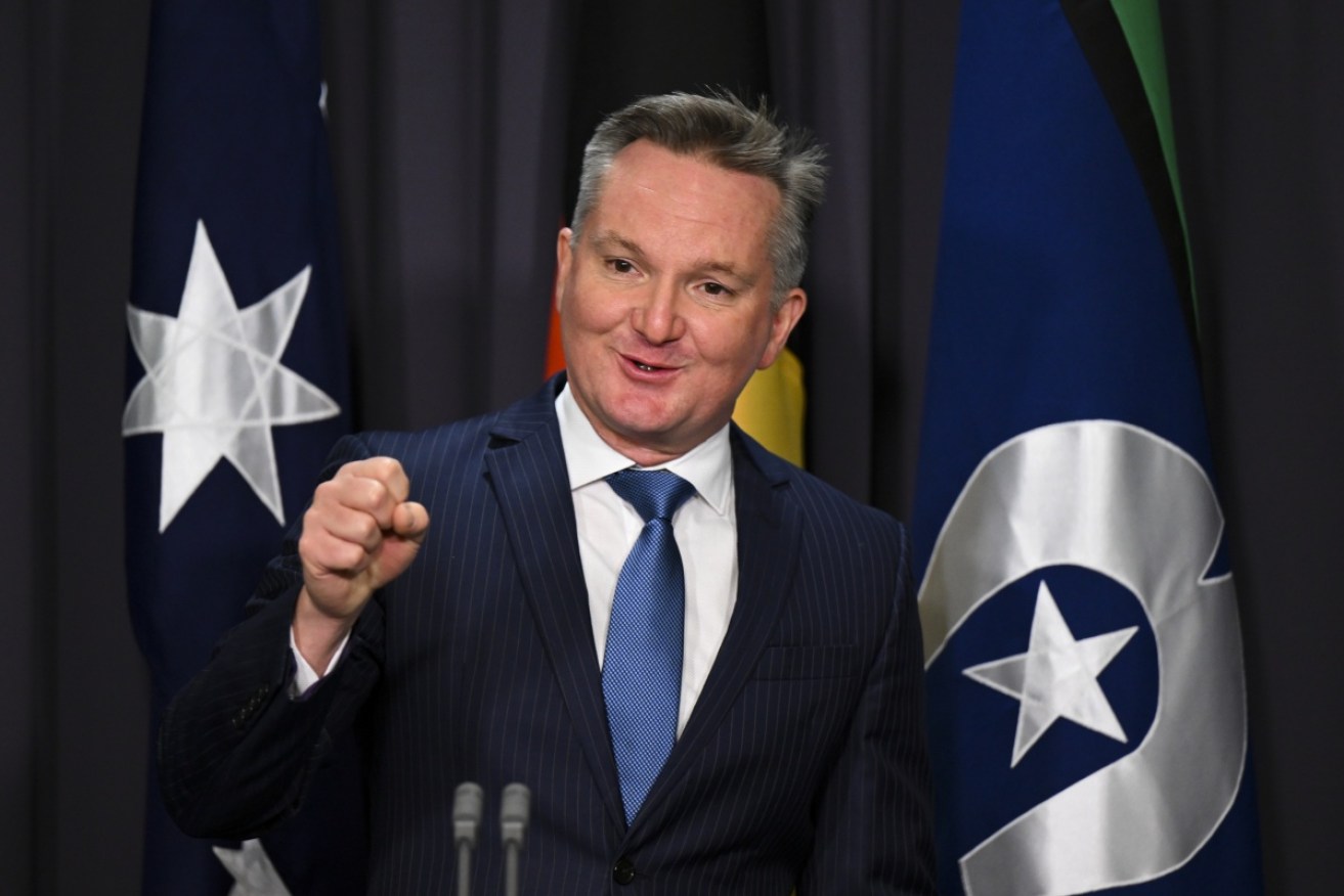 The government "won't walk away" from its climate-change election promises, Chris Bowen says.