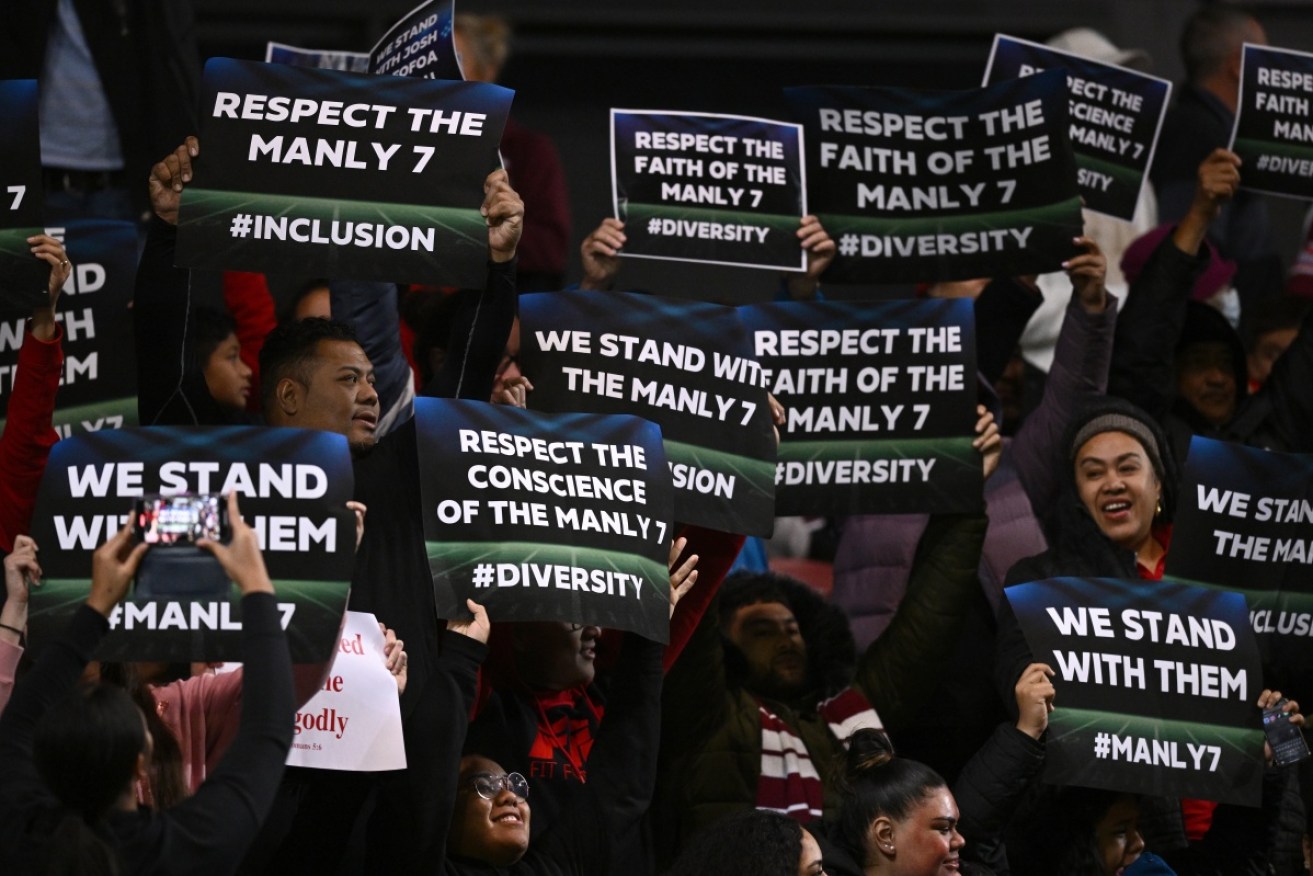 Some fans at 4 Pines Park showed support for the Manly players who boycotted the rainbow jersey. 