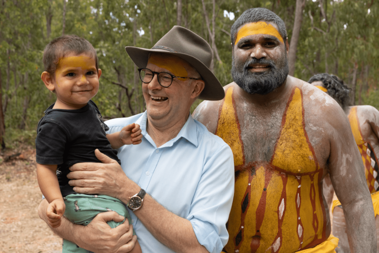 PM Anthony Albanese shares a smile with one of the younger guests at the Garma Festival.