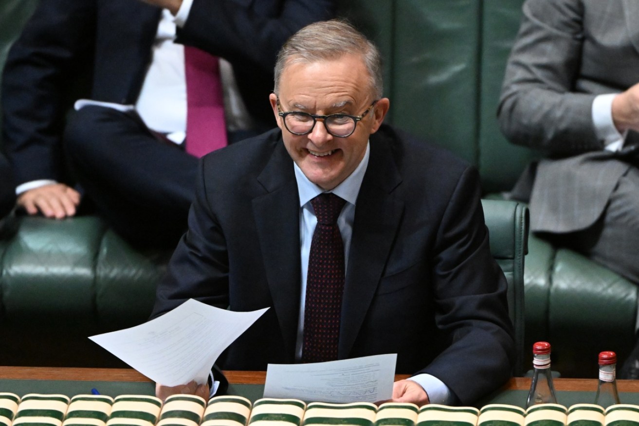 Mr Albanese looked on as laws to raise Australia's carbon emissions targets passed the lower house.
