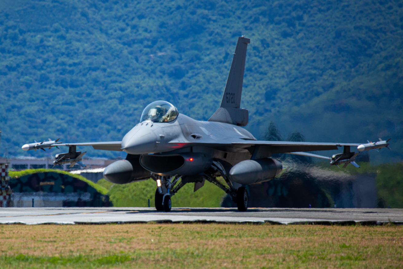 Fresh from a patrol monitoring China's border incursion, this US-supplied F-16 waits to refuel and return to the air.