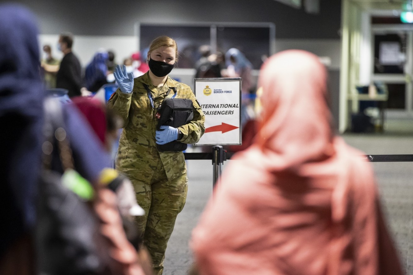 Extra resources have been directed to help process Australia's visa backlog from Afghanistan.