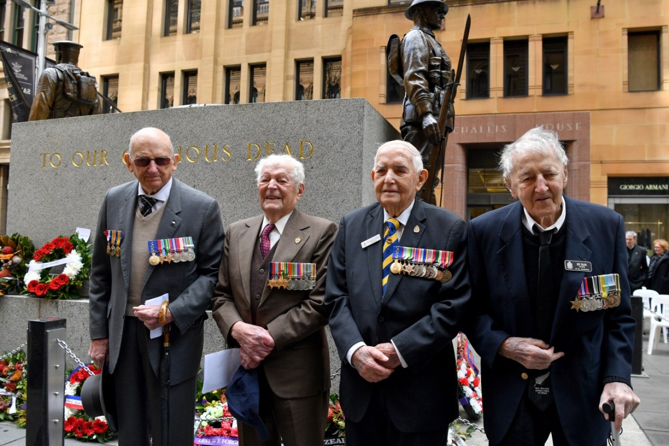 War vets Aubrey Knowles, Dennis Davis, Don Kennedy and Ken Frank remembered victory in the Pacific. 