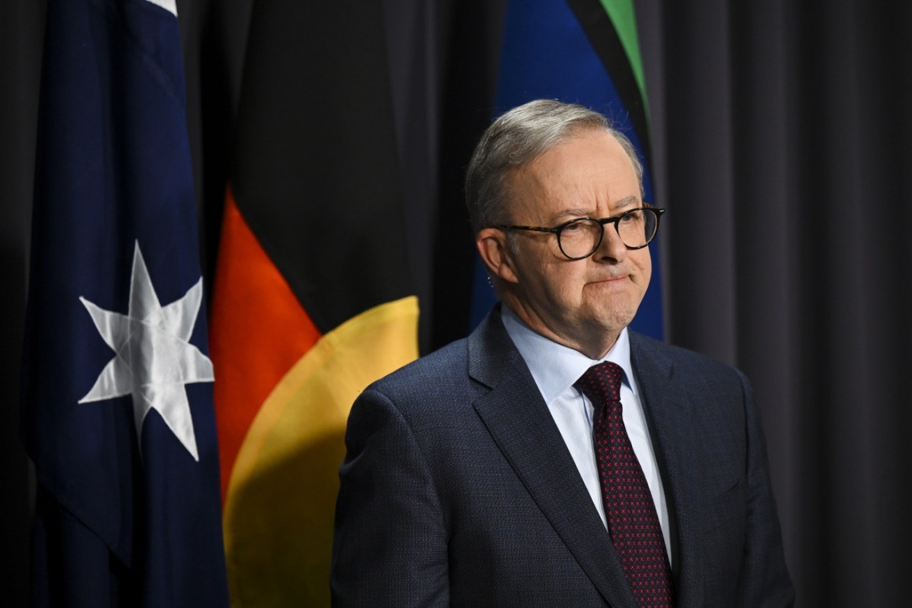Despite criticism from health experts, the prime minister says the lowering of mandatory isolation periods for COVID to five days was a necessary move.