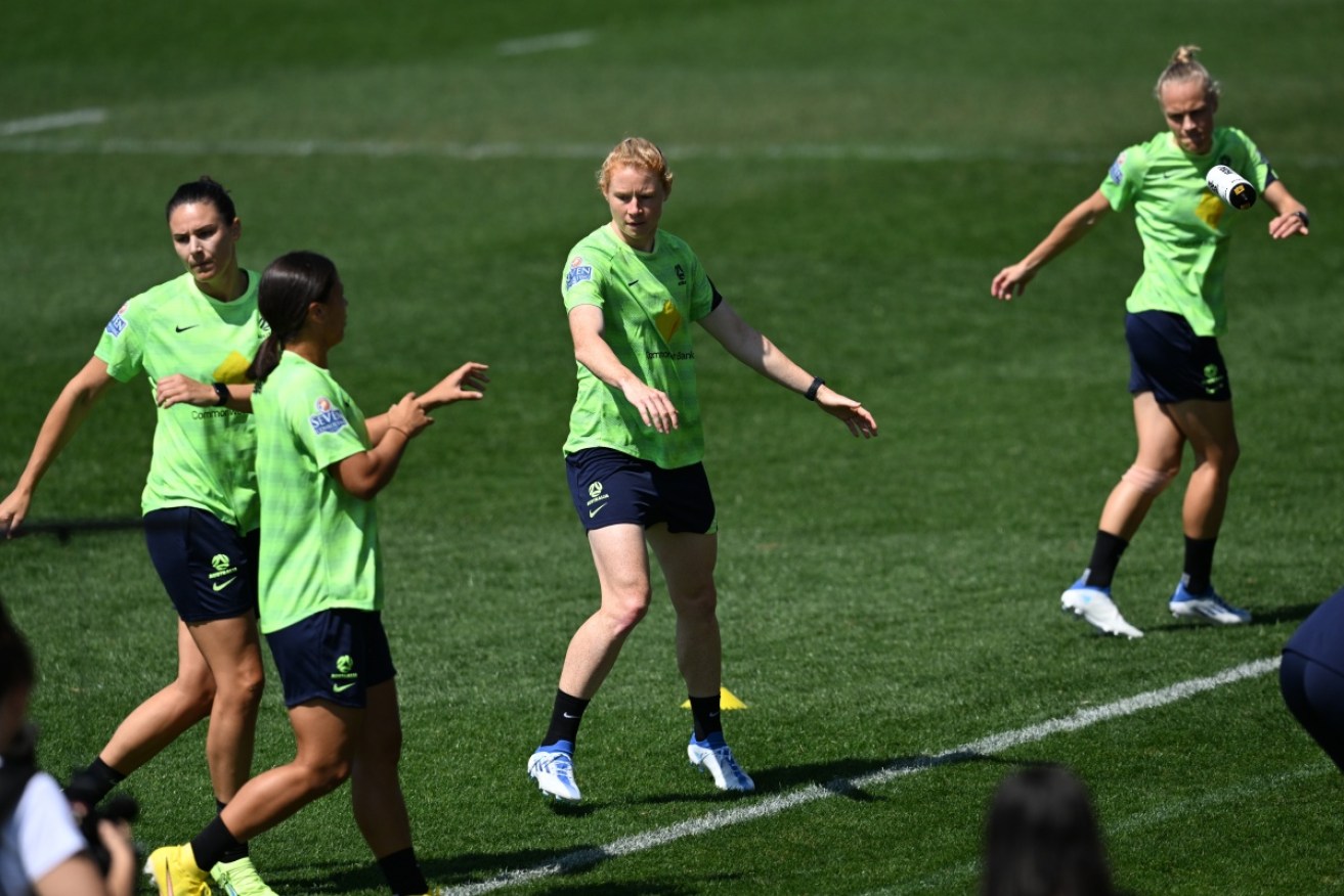 Clare Polkinghorne goes through drills with her Matildas teammates ahead of the Canada clash.