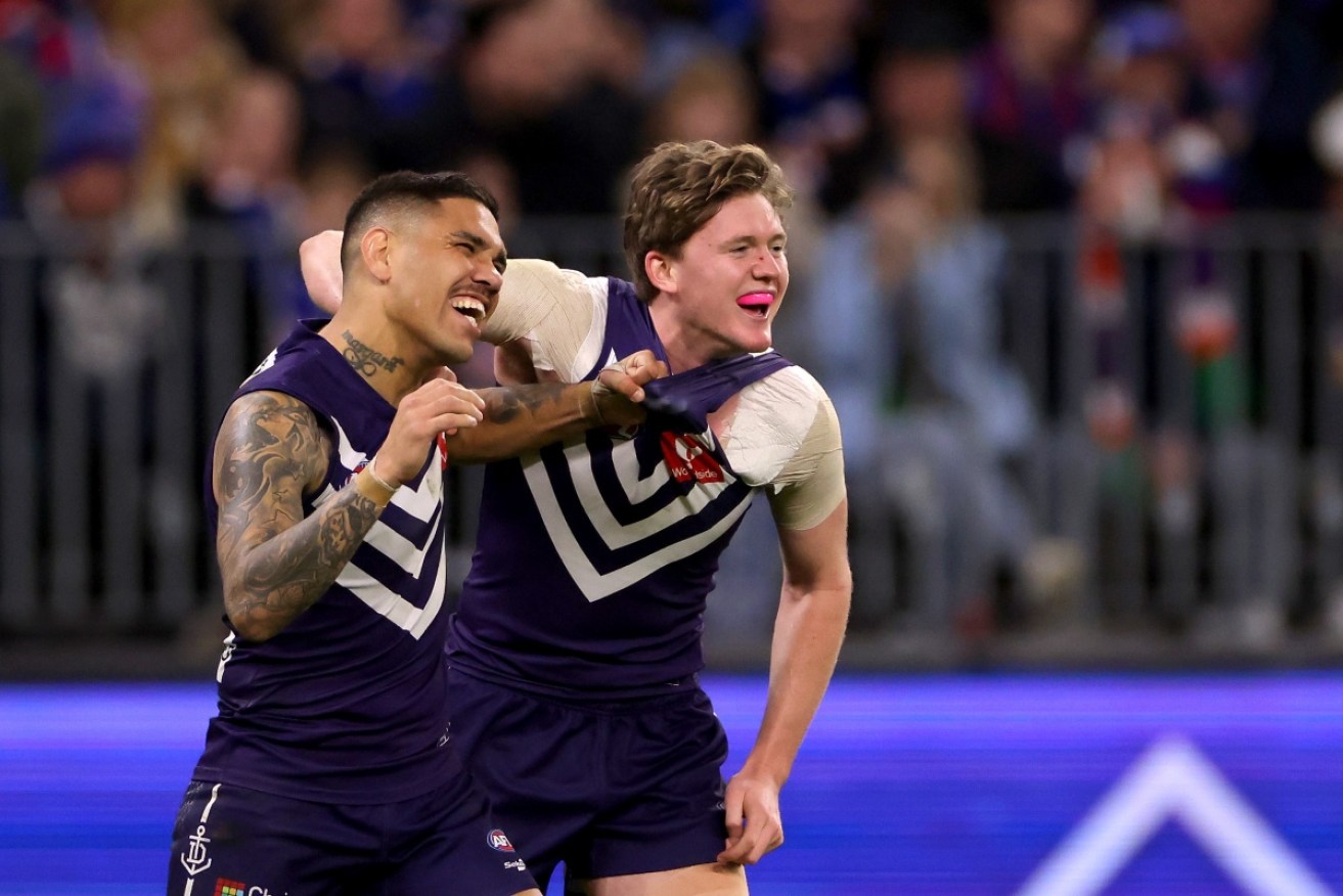 Michael Walters congratulates Nathan O'Driscoll for a goal in the Dockers' comeback victory over the Western Bulldogs.