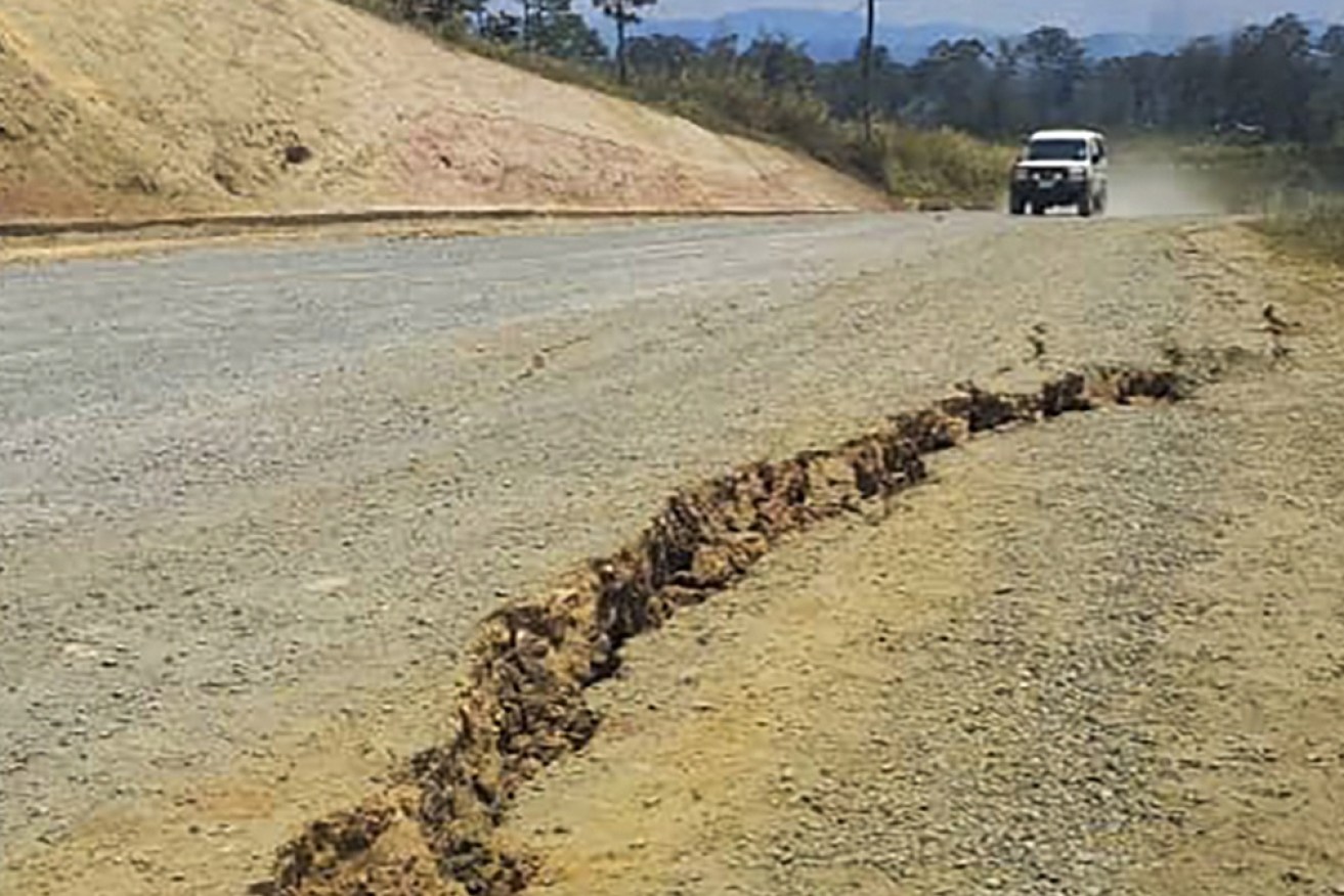 PNG residents have posted images to social media of cracked roads, along with damaged buildings.