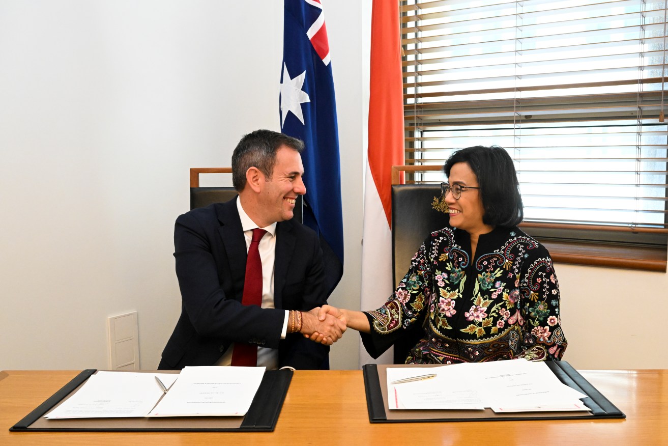 Australia and Indonesia have agreed to step up economic cooperation, in the face of global risks.