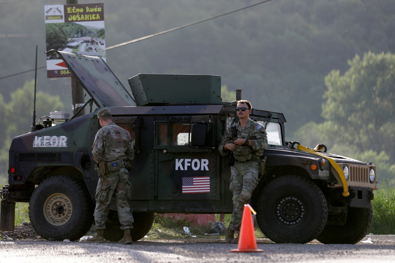 NATO says it is ready to send more troops to Kosovo if tensions among minority Serbs flare again. 