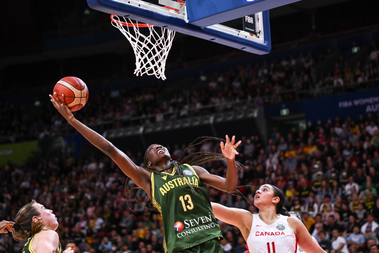Ezi Magbegor helps Australia advance to the knockout stage of the World Cup after beating Canada.