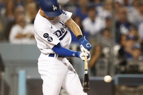 Dodgers, Yankees ease to MLB playoff wins
