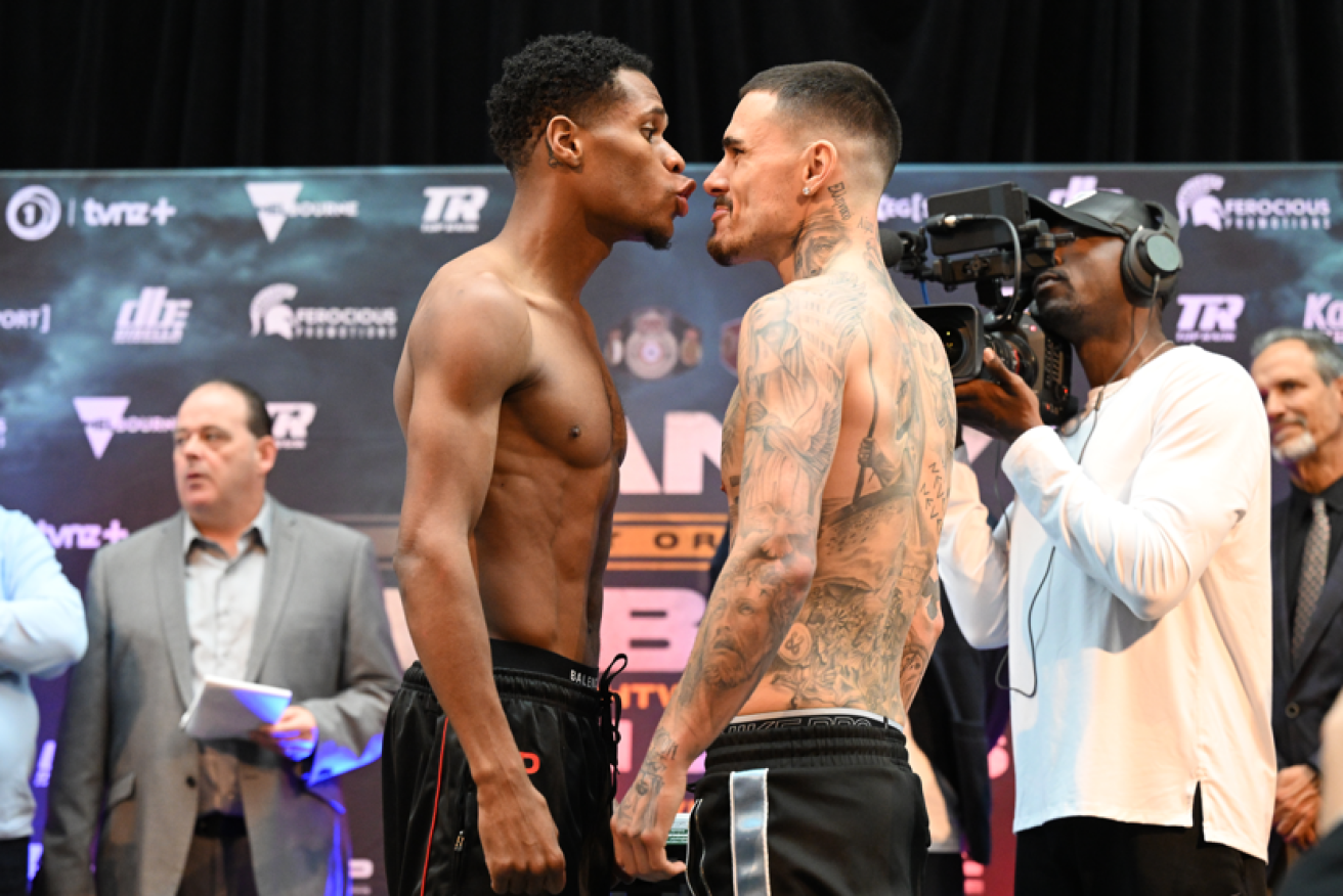 Devin Haney (l) snarls in the face of Australia's George Kambosos before their 2022 title bout. <i>Photo: AAP</i>