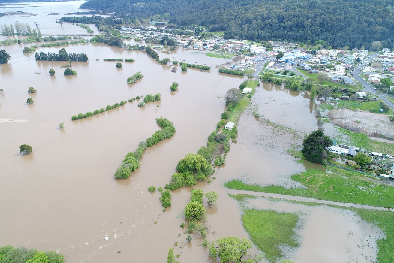 Tasmania begins flood clean-up – with more rain on way