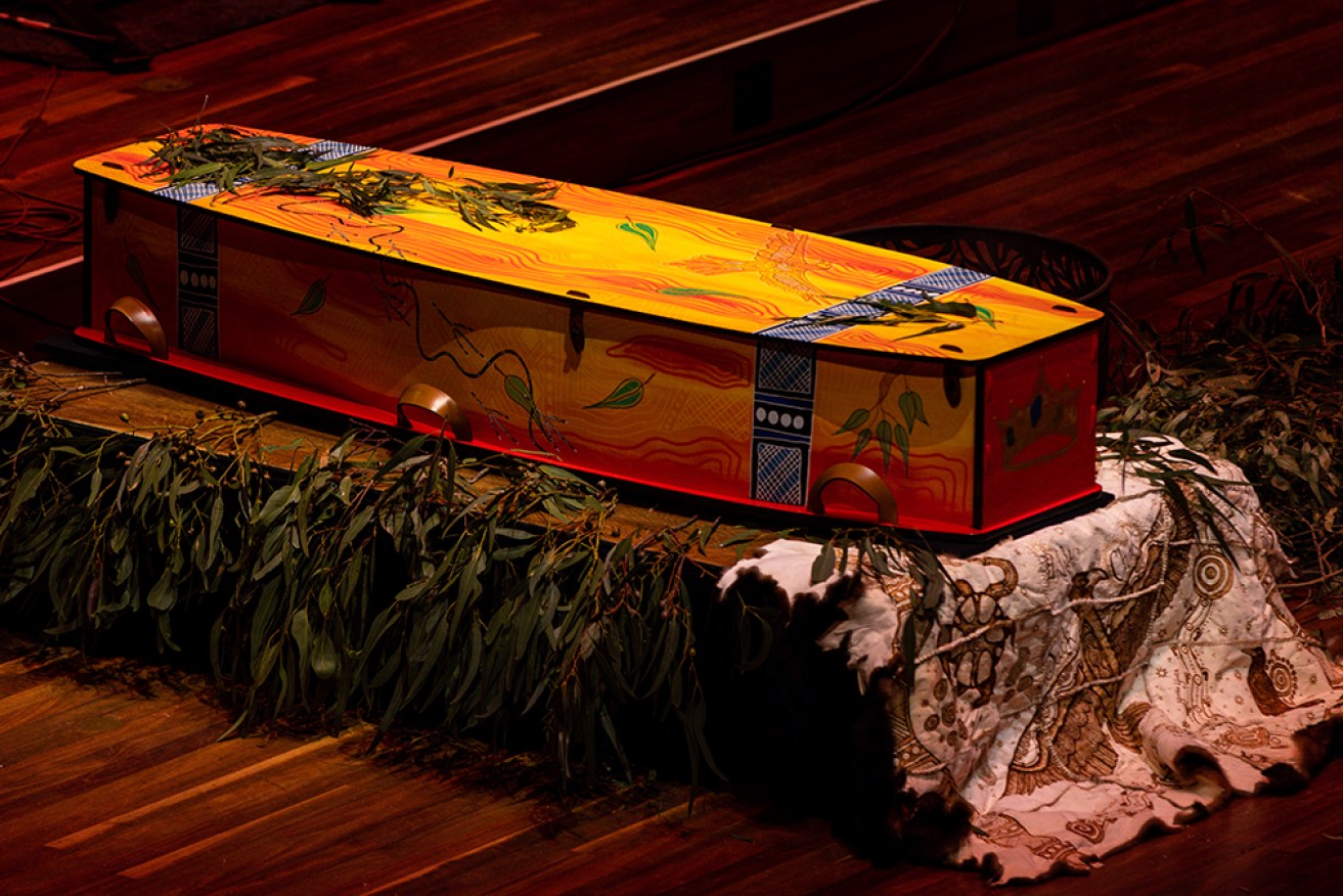 Uncle Jack Charles' coffin was adorned with Indigenous designs at a state funeral in Melbourne.