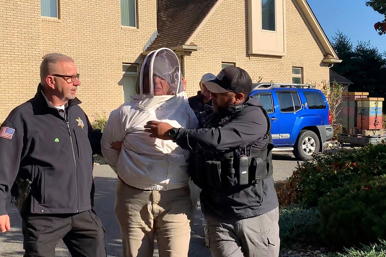 Rorie Woods put on a bee suit before unleashing stingers on police.