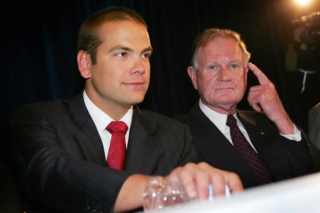Mr Cowley with Lachlan Murdoch at the News Corp annual meeting in Adelaide in 2004.