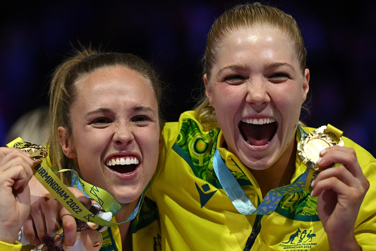 Paige Hadley (left, with Kate Moloney) will return from injury to lead the Diamonds against England. 