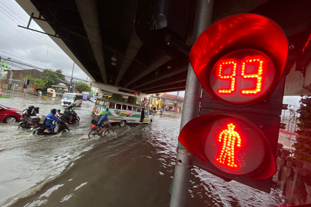 Floods and winds from tropical storm Nalgae have killed 45 people in the Philippines.