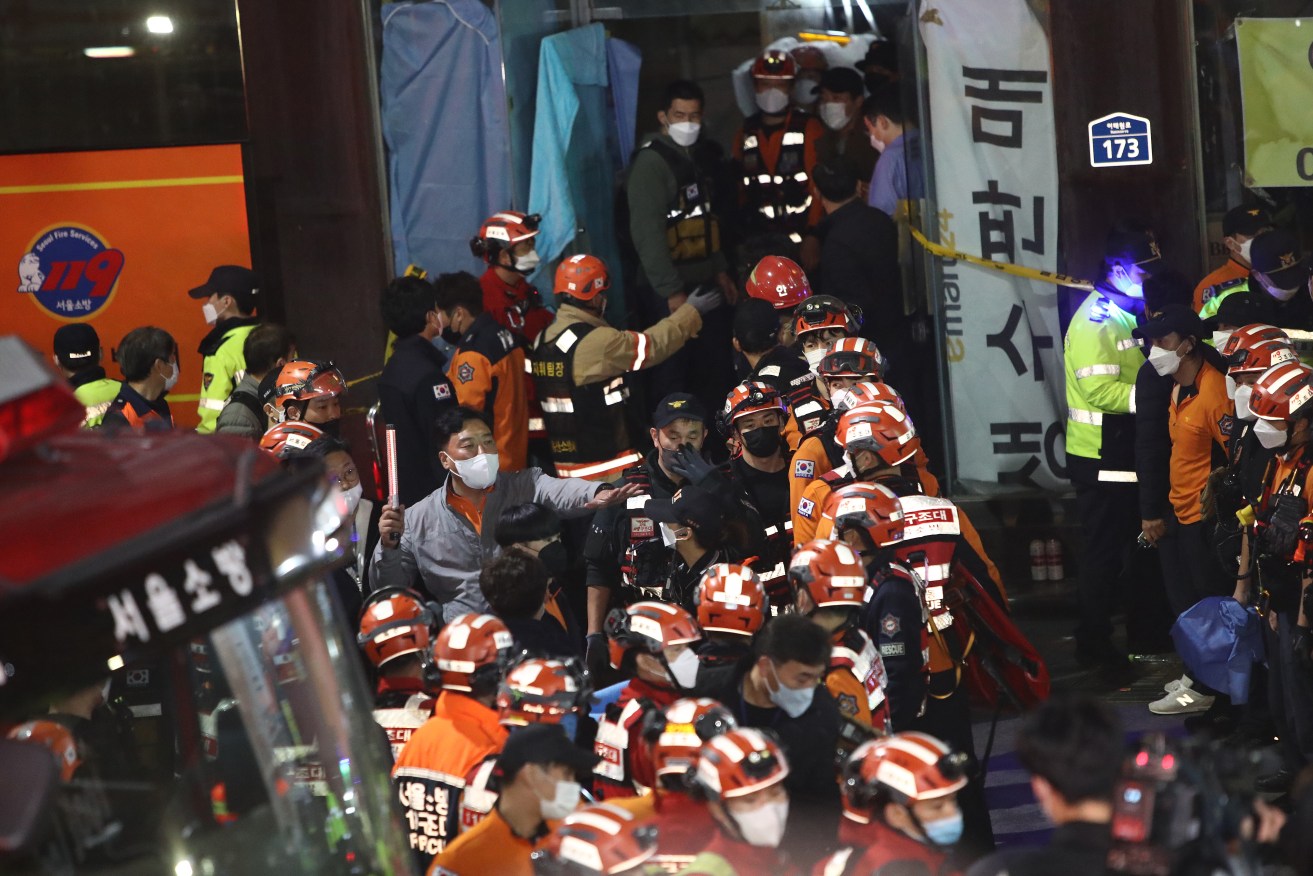 Australians in Seoul have been urged to contact their families, after a deadly stampede.