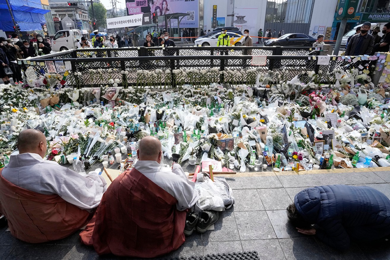 South Korea's police chief admits responsibility for failing to prevent a deadly Halloween crush. 