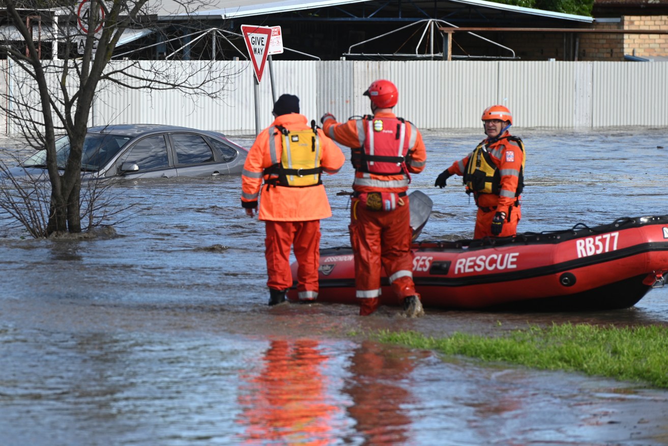 Rescues continue in floodwaters near the Victorian-NSW border even as weather conditions ease, if only temporarily.