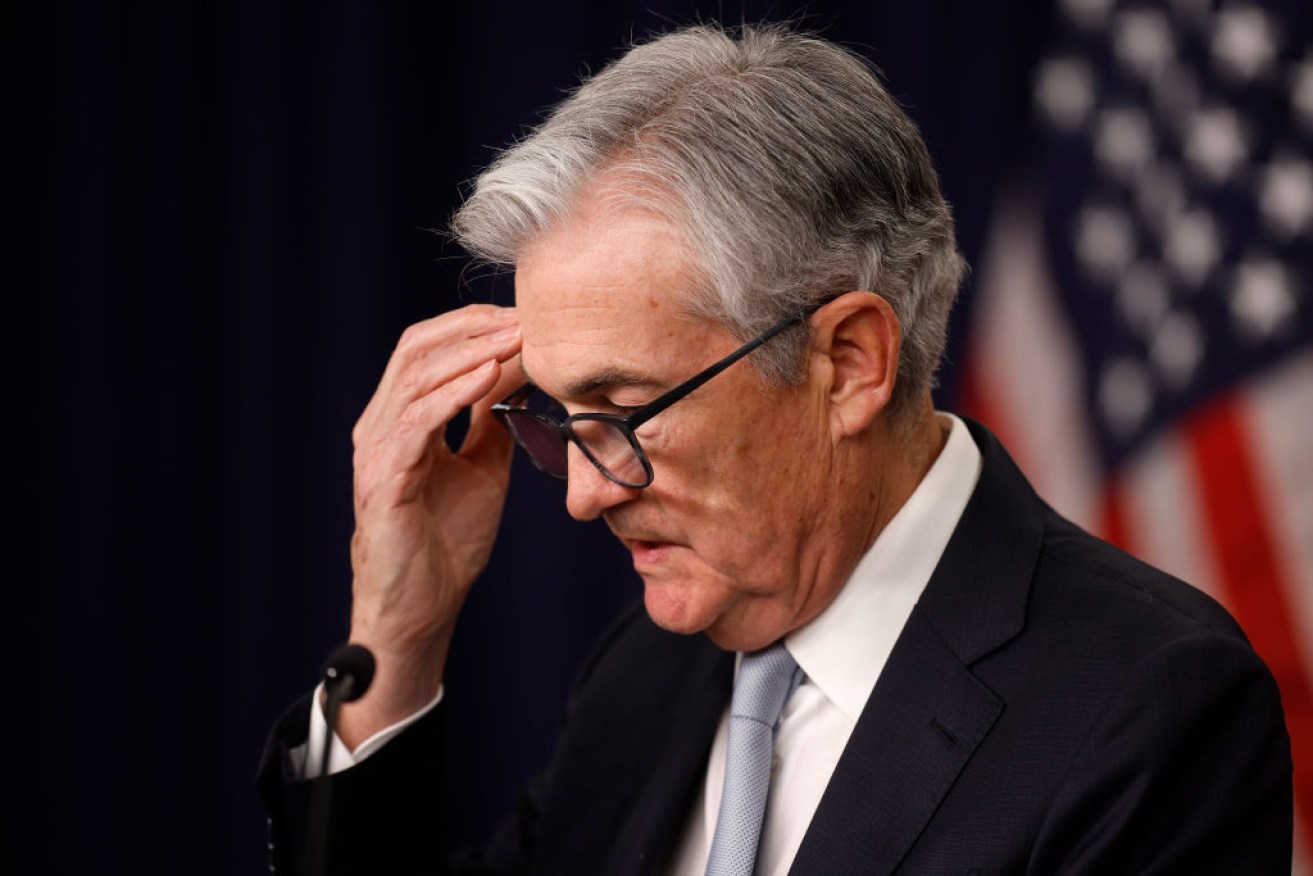 Federal Reserve Bank Board Chairman Jerome Powell announces the interest rate will be raised.