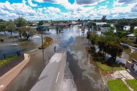 Clean-up begins as floods move downstream